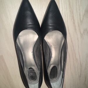 Black Trotters Heels